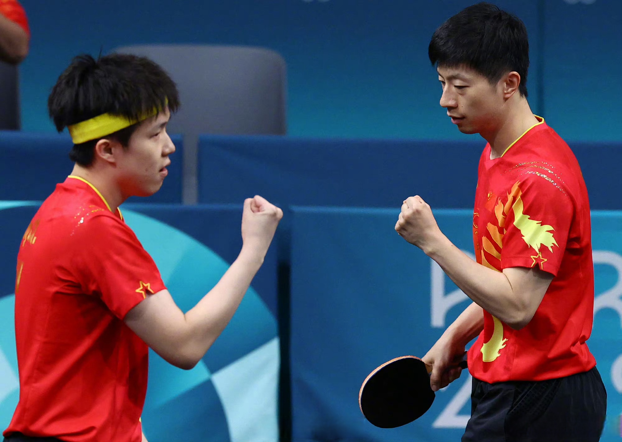 中国乒乓球队险胜比利时乒乓球队，马龙关键制胜
